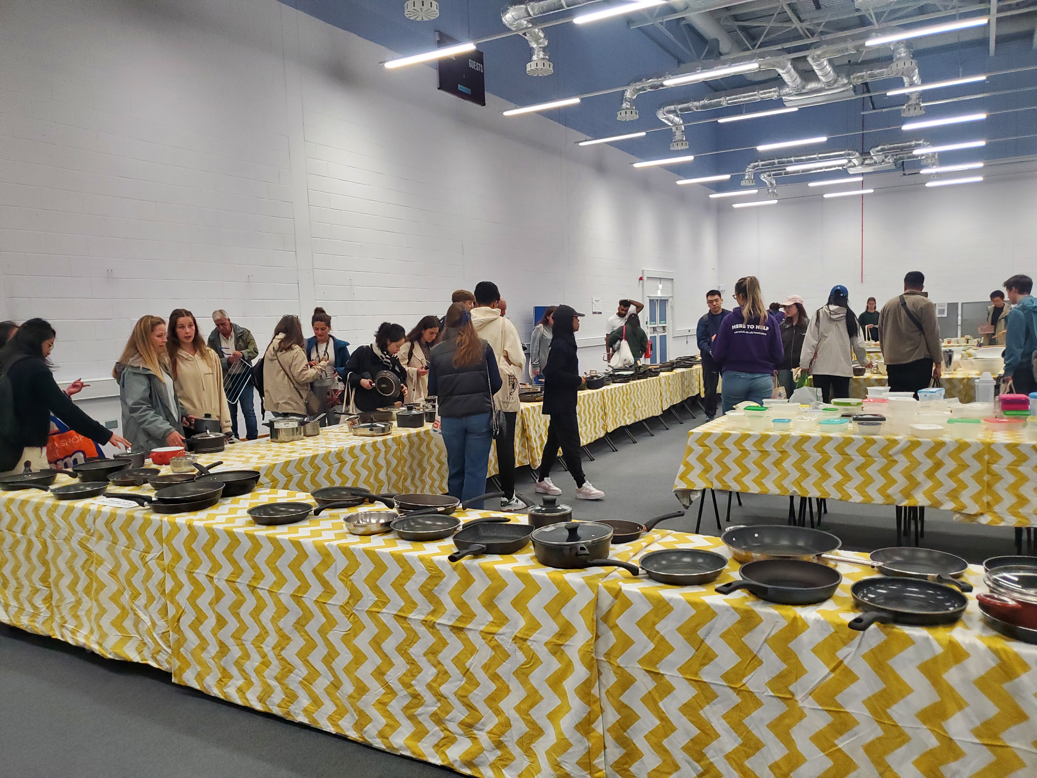 Students browsing items at the Kitchen Kit Market