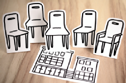 empty chairs cut out of paper