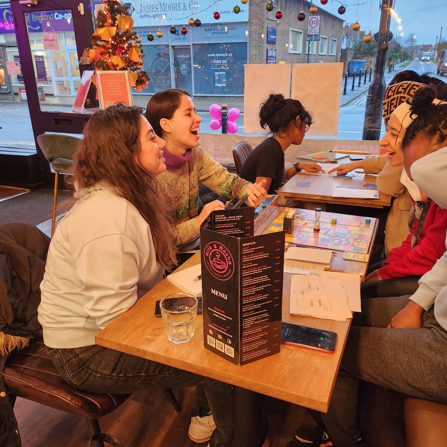 People chatting in a coffee shop