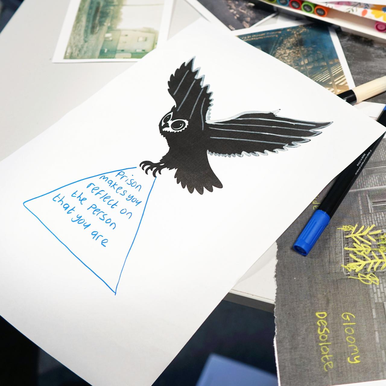 Drawing of an owl carrying a triangular sign that says 'prison makes you reflect on the person that you are' 