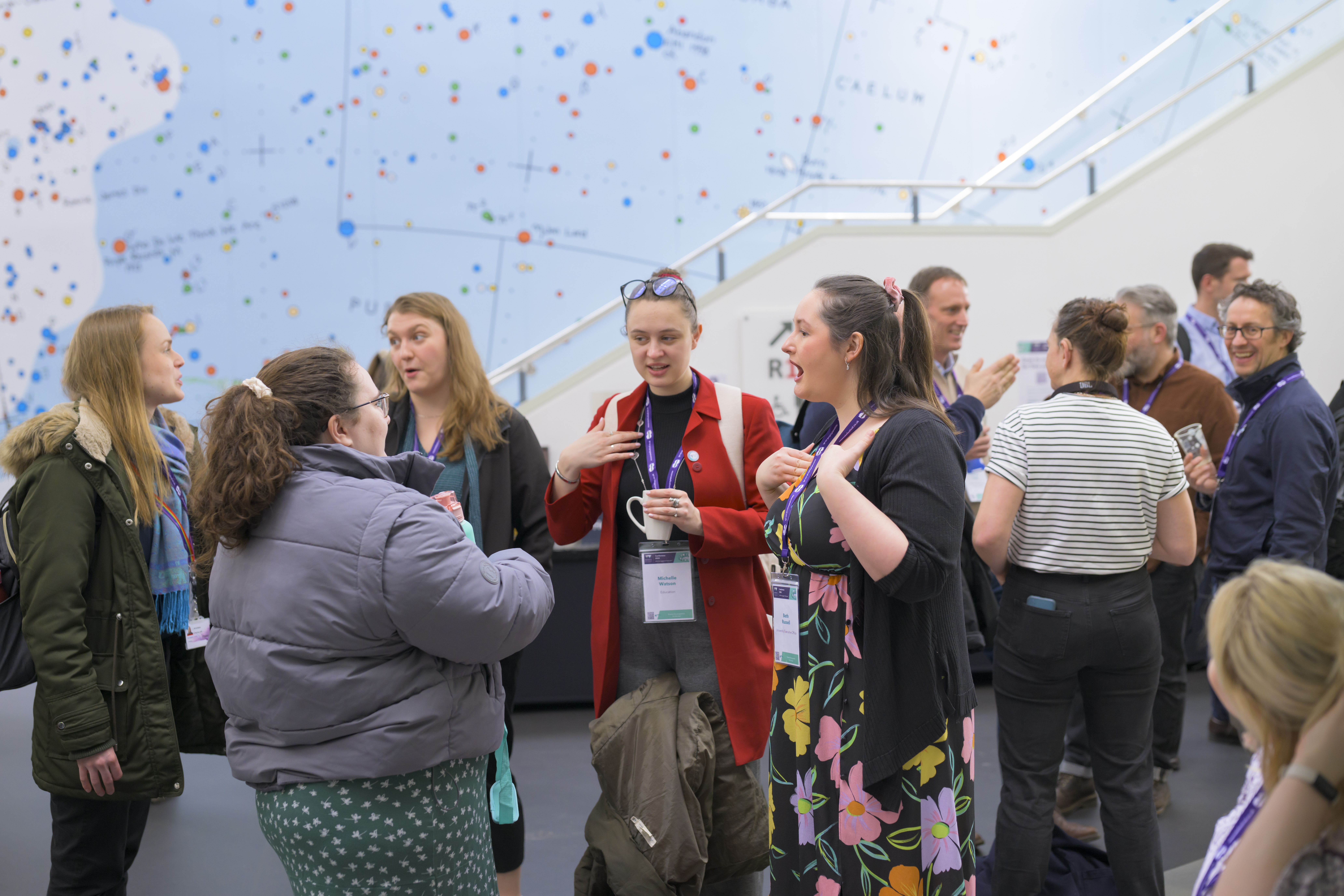 People networking in Ramphal atrium