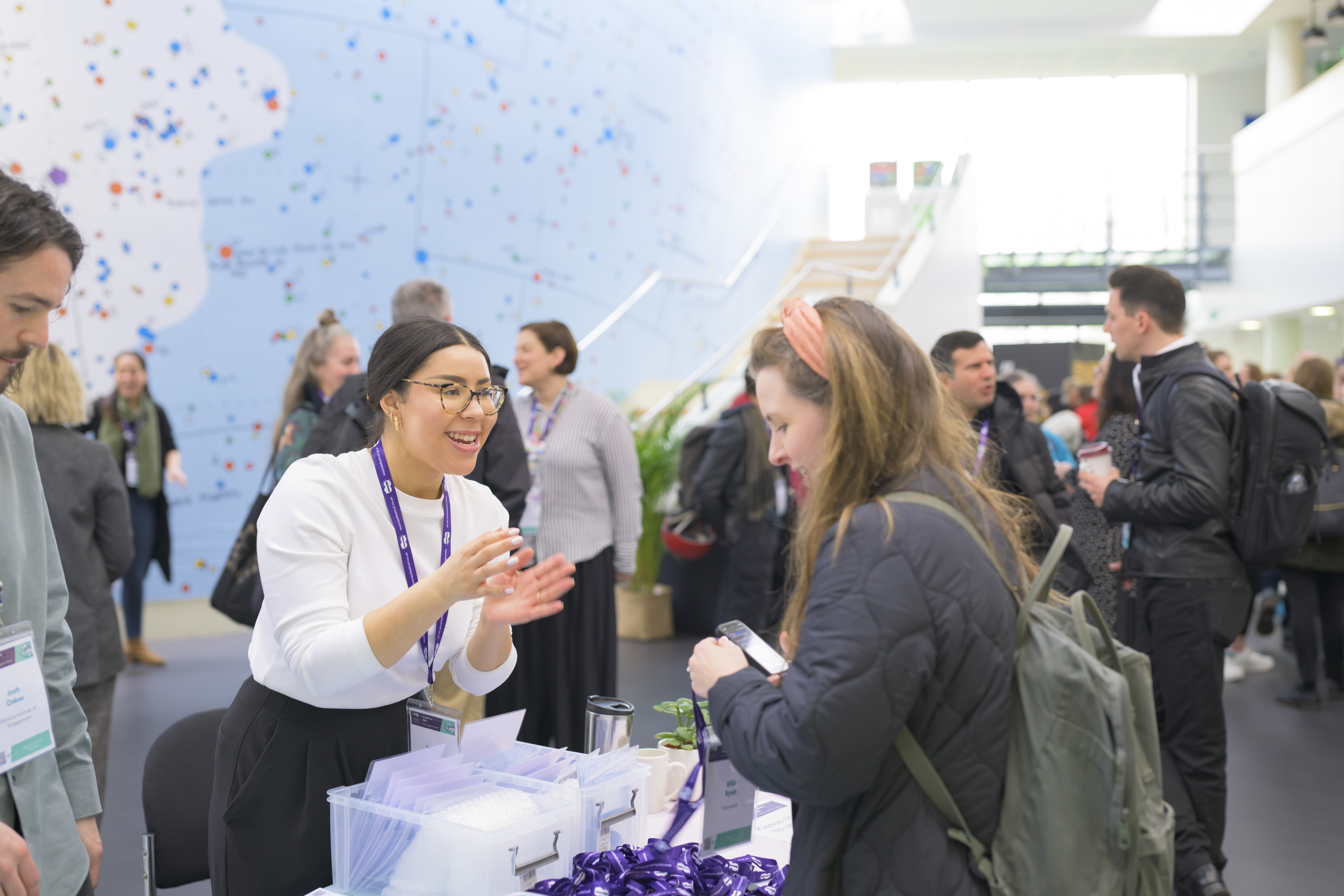 People networking in Rampahl foyer