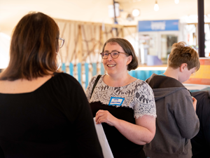 People chatting at an event